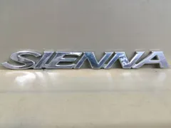 Эмблема Toyota Sienna, 2009 г.