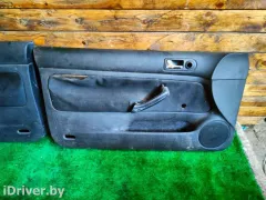Обшивка двери (дверная карта) комплект Volkswagen Golf, 2004 г.