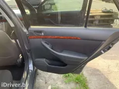 Обшивка двери (дверная карта) комплект Toyota Avensis, 2005 г.
