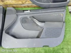 Обшивка двери (дверная карта) комплект Volkswagen Golf, 2005 г.