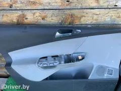 Обшивка двери (дверная карта) комплект Volkswagen Passat, 2007 г.