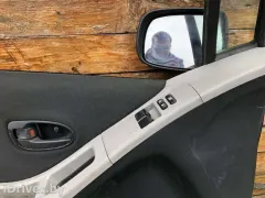 Обшивка двери передней левой (дверная карта) Toyota Yaris, 2006 г.
