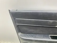 Обшивка двери передней левой (дверная карта) Audi A6, 1996 г.