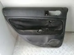Обшивка двери задней левой (дверная карта) Volkswagen Passat, 1999 г.
