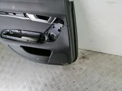 Обшивка двери задней левой (дверная карта) Audi A6, 2009 г.