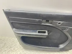 Обшивка двери передней левой (дверная карта) Audi A6, 1996 г.