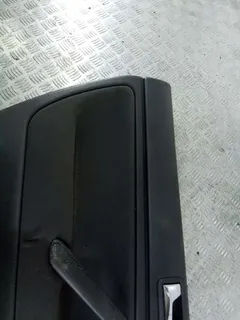 Обшивка двери задней левой (дверная карта) Volkswagen Passat, 2001 г.