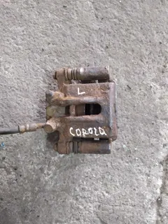 Суппорт задний левый Toyota Corolla, 2004 г.