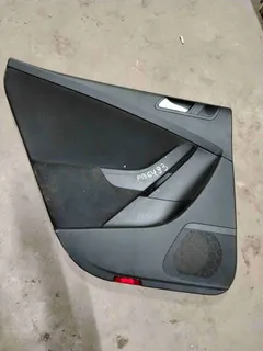 Обшивка двери задней левой (дверная карта) Volkswagen Passat, 2009 г.