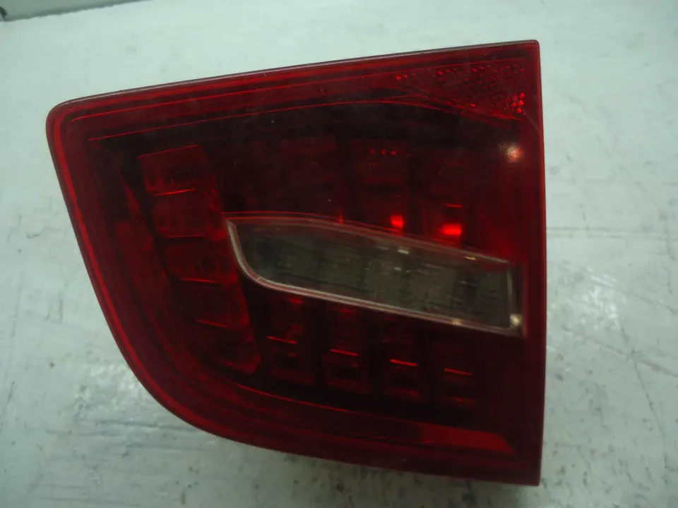 Фонарь крышки багажника левый Audi A6, 2009 г.