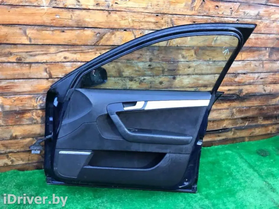 Обшивка двери передней правой (дверная карта) Audi A3, 2006 г.