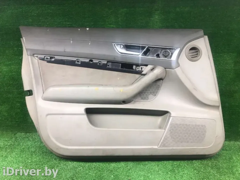 Обшивка двери передней левой (дверная карта) Audi A6, 2006 г.