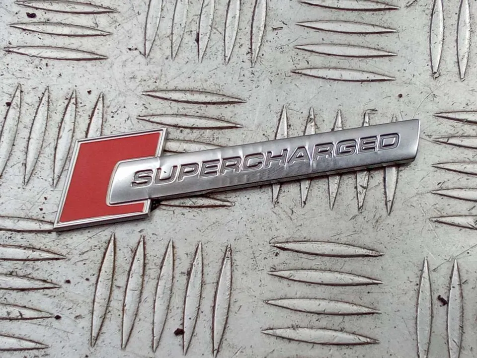 Эмблема Audi A6, 2012 г.